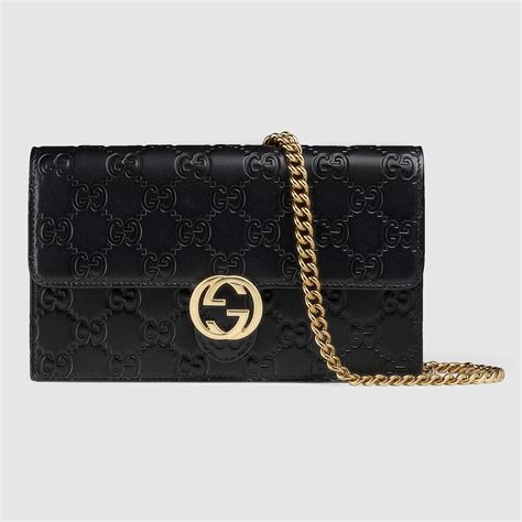 gucci wallet on a chain on a shoulder chain|Gucci signature wallet on chain.